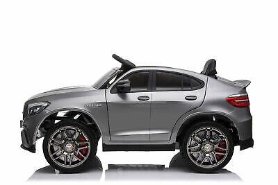 "Silver Mercedes GLC 63S AMG electric ride on car for kids on a white background."