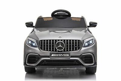 "Metallic silver Mercedes GLC 63S AMG kids ride on car coupé 12 volt showcased on white background"