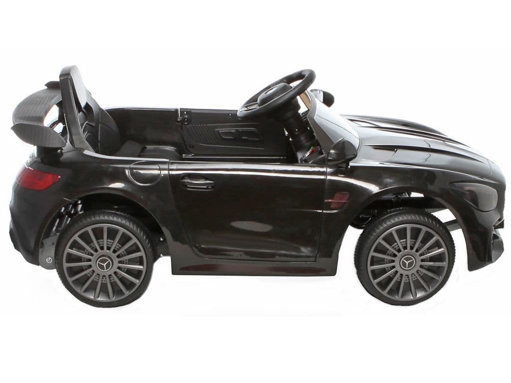 Black Mercedes AMG GTR electric ride-on car for kids on white background