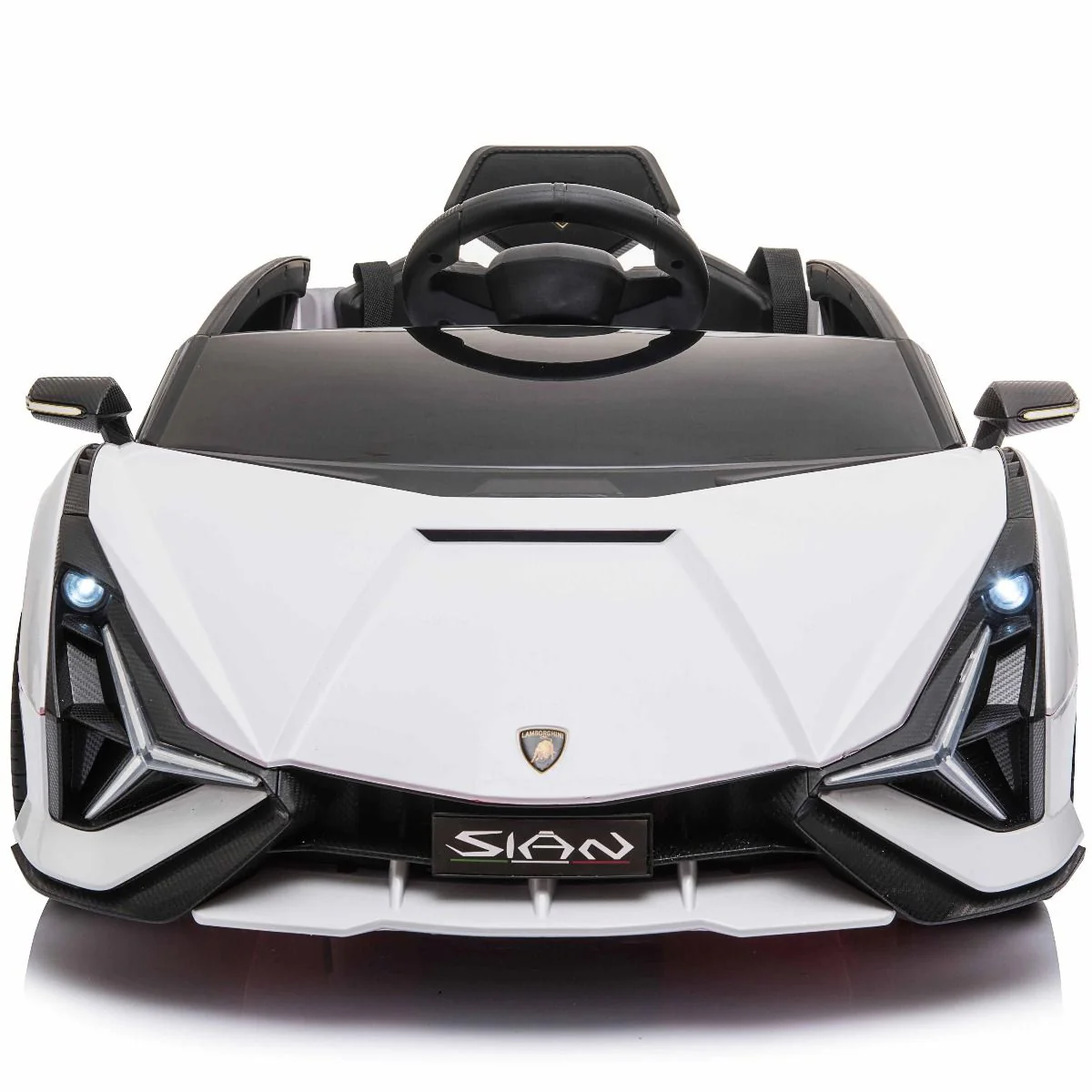 "White and black 12V Lamborghini Sian child's car with MP4 screen and parental control."